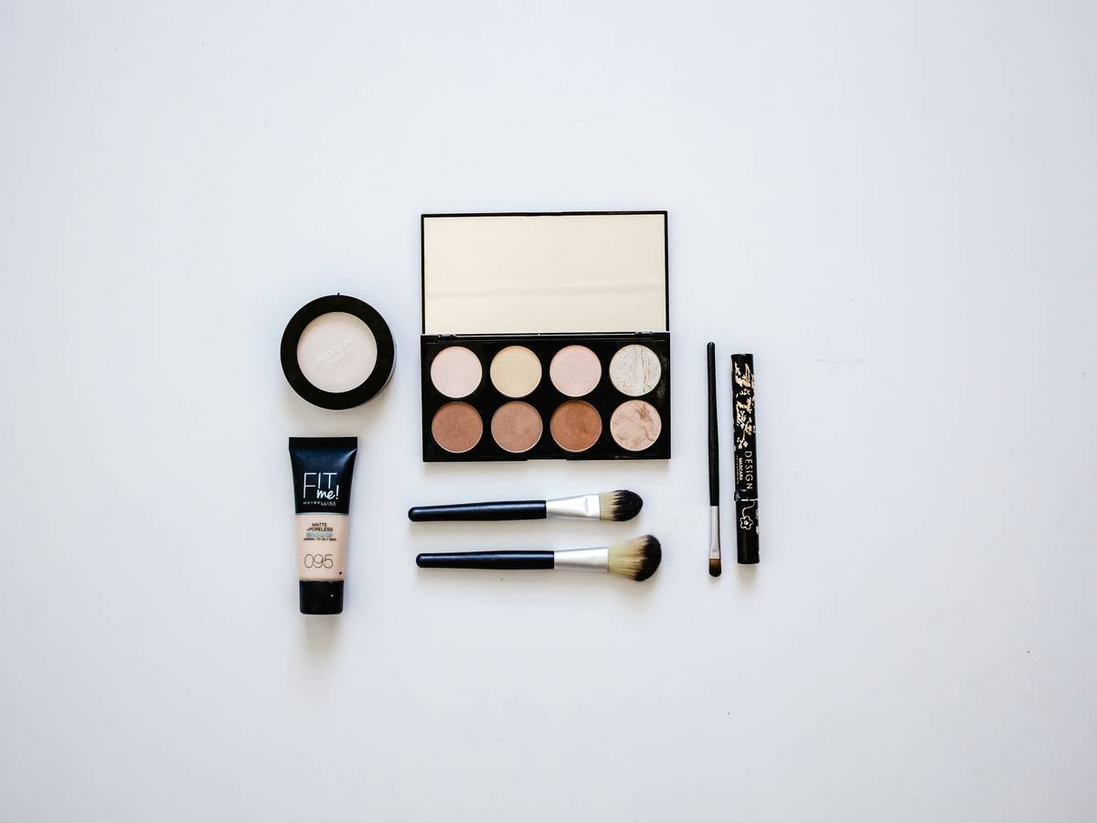Makeup with the palette open on a white background